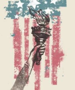 Faded, sprayed artwork of Lady Liberty's torch in front of the American flag.