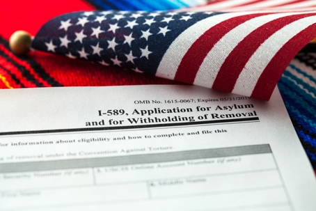 Applications for Asylum next to American flag